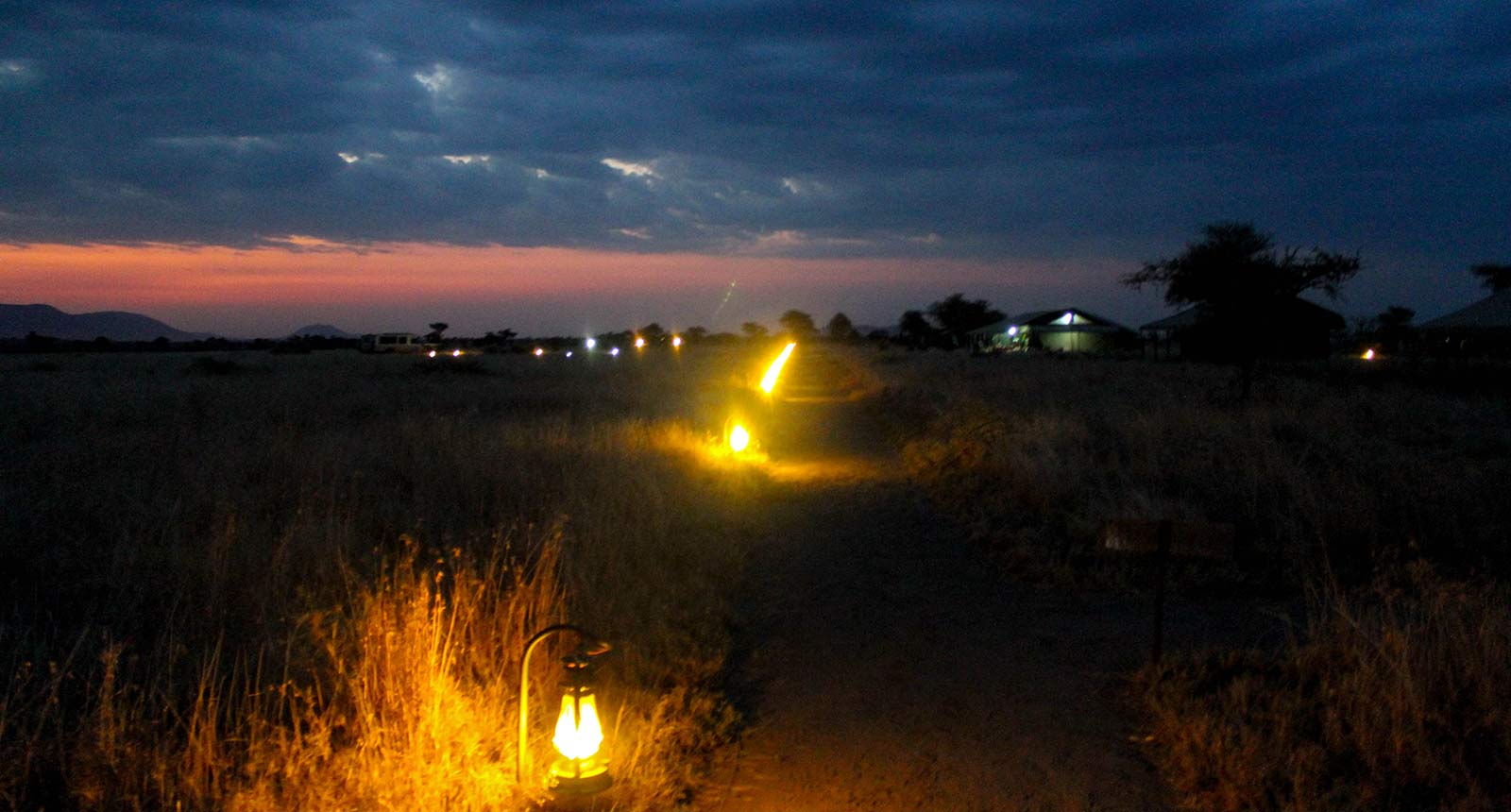 Serengeti Heritage Camp illuminated at night