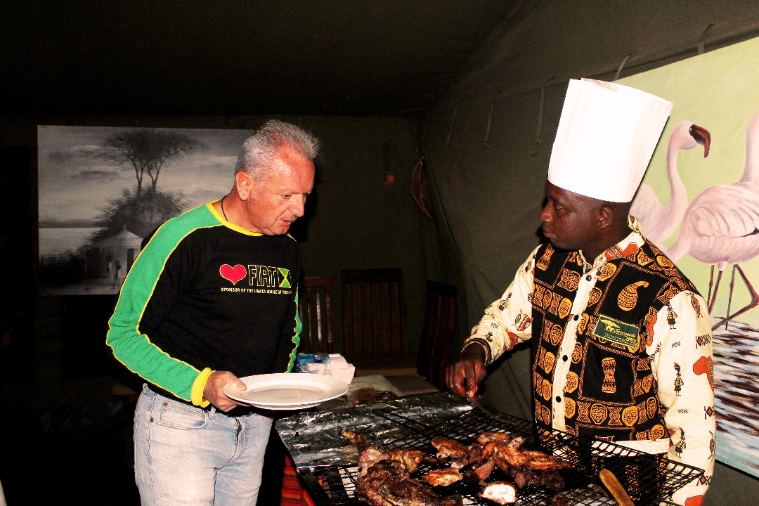 Camp chefs preparing a meal